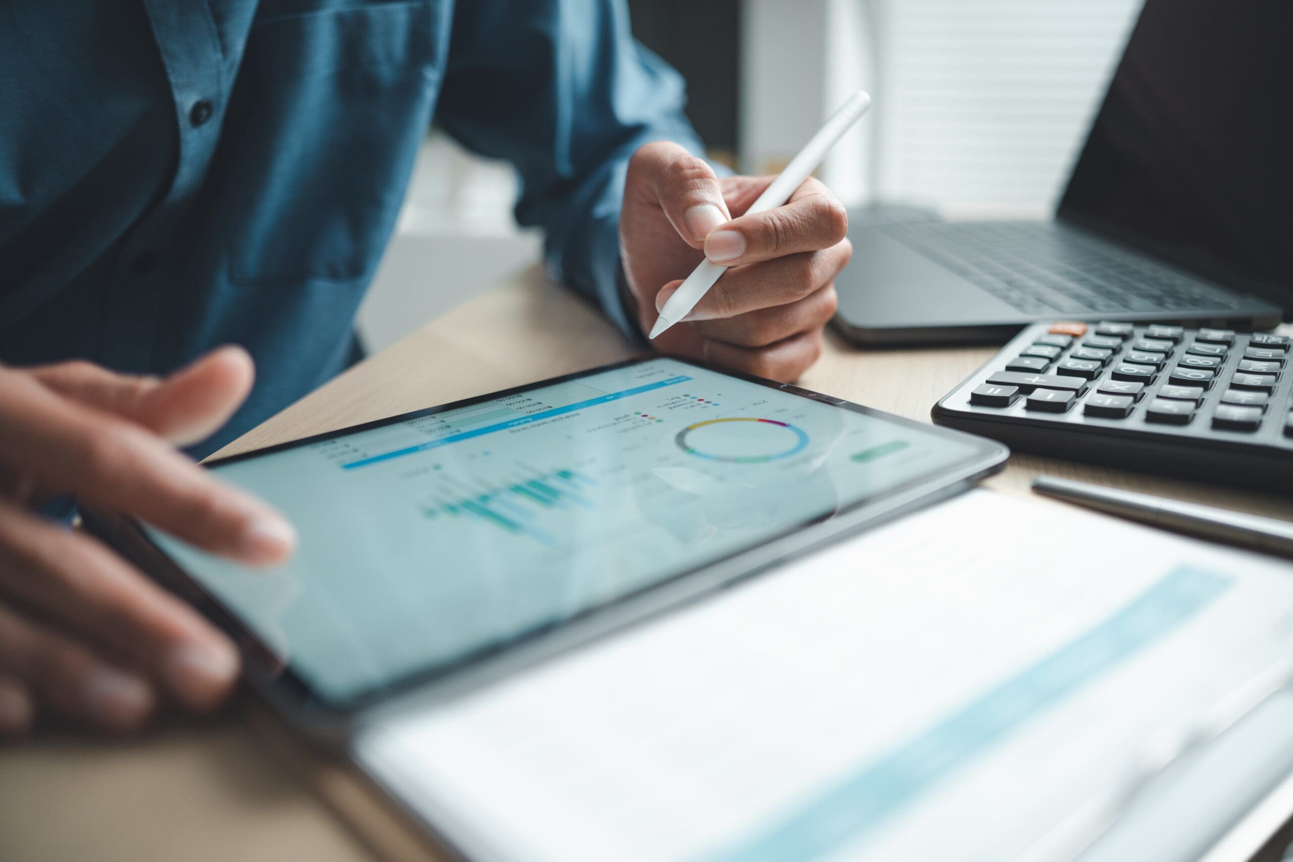Business-Professional-Analyzing-Financial-Data-On-Digital-Tablet-Dashboard